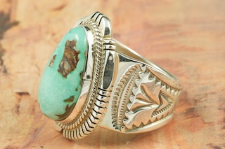 Genuine Royston Turquoise Stone set in Sterling Silver Ring. The Royston Turquoise Mine is located in Nye County, Nevada. Created by Navajo Artist Milton Lee. Signed by the artist.